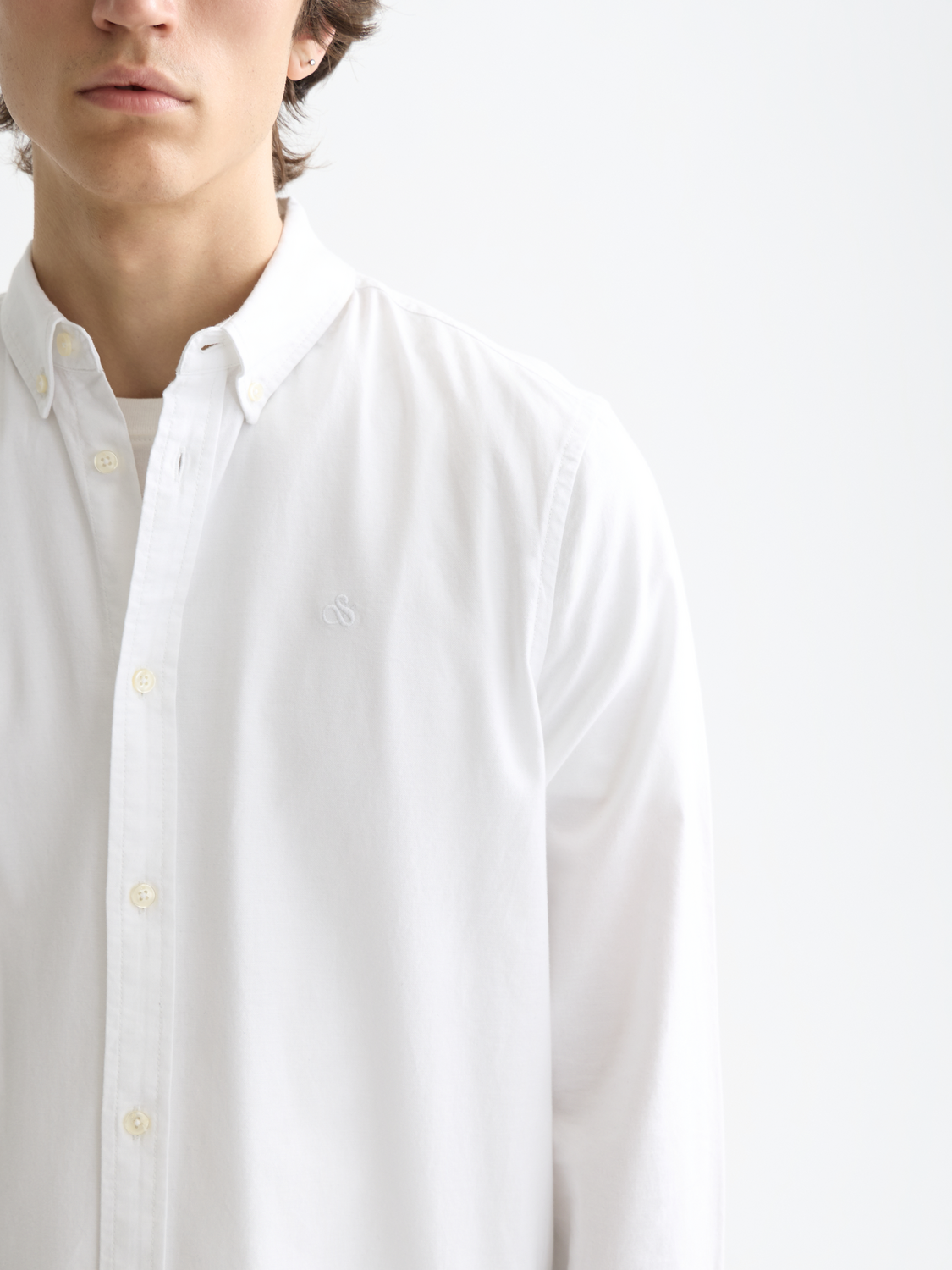 Long sleeve Oxford shirt by Scotch & Soda, featuring classic collar and button front in blue denim fabric.