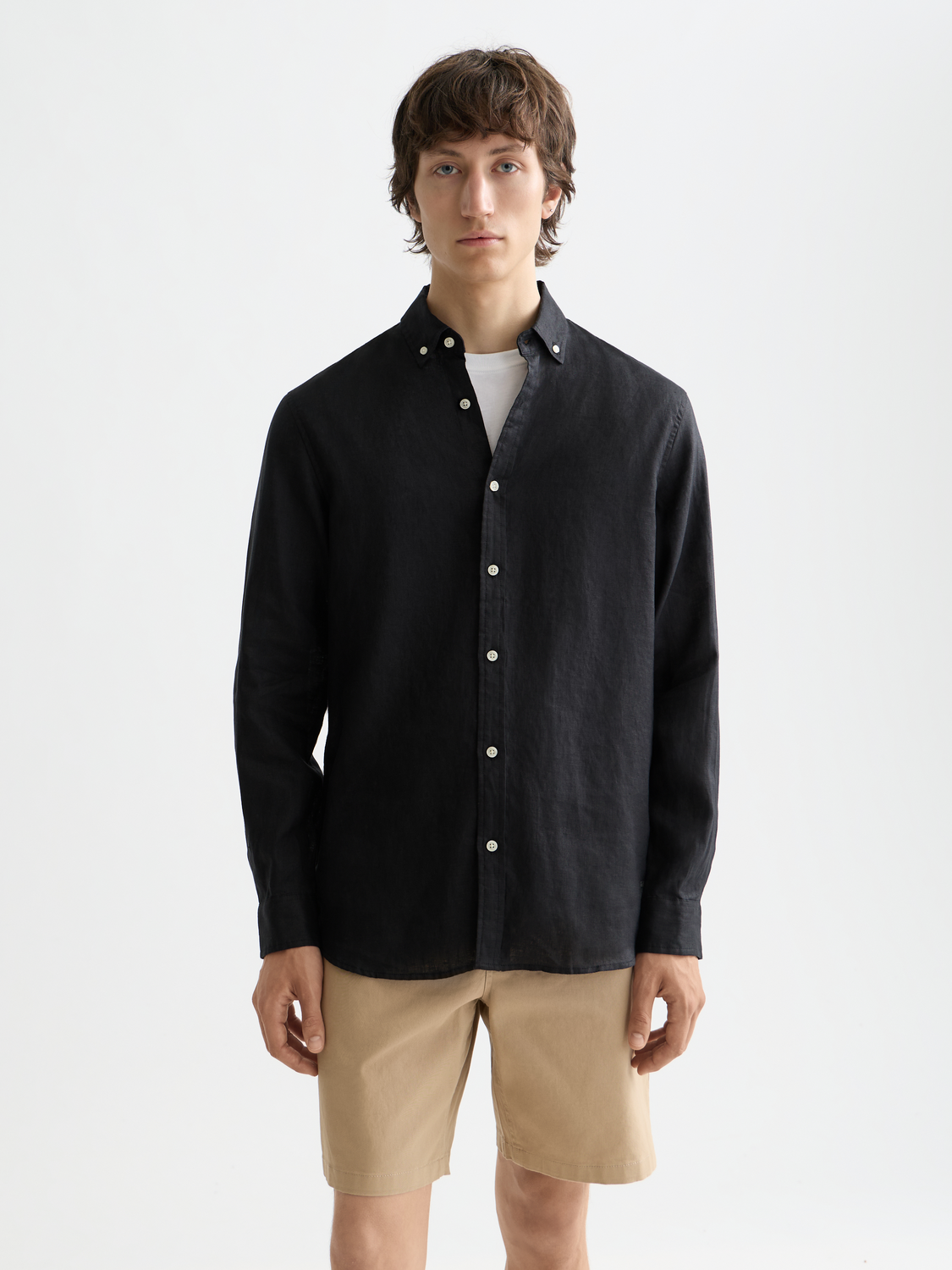 Long sleeve linen shirt by Scotch & Soda featuring a relaxed fit and natural linen fabric, displayed on a hanger.