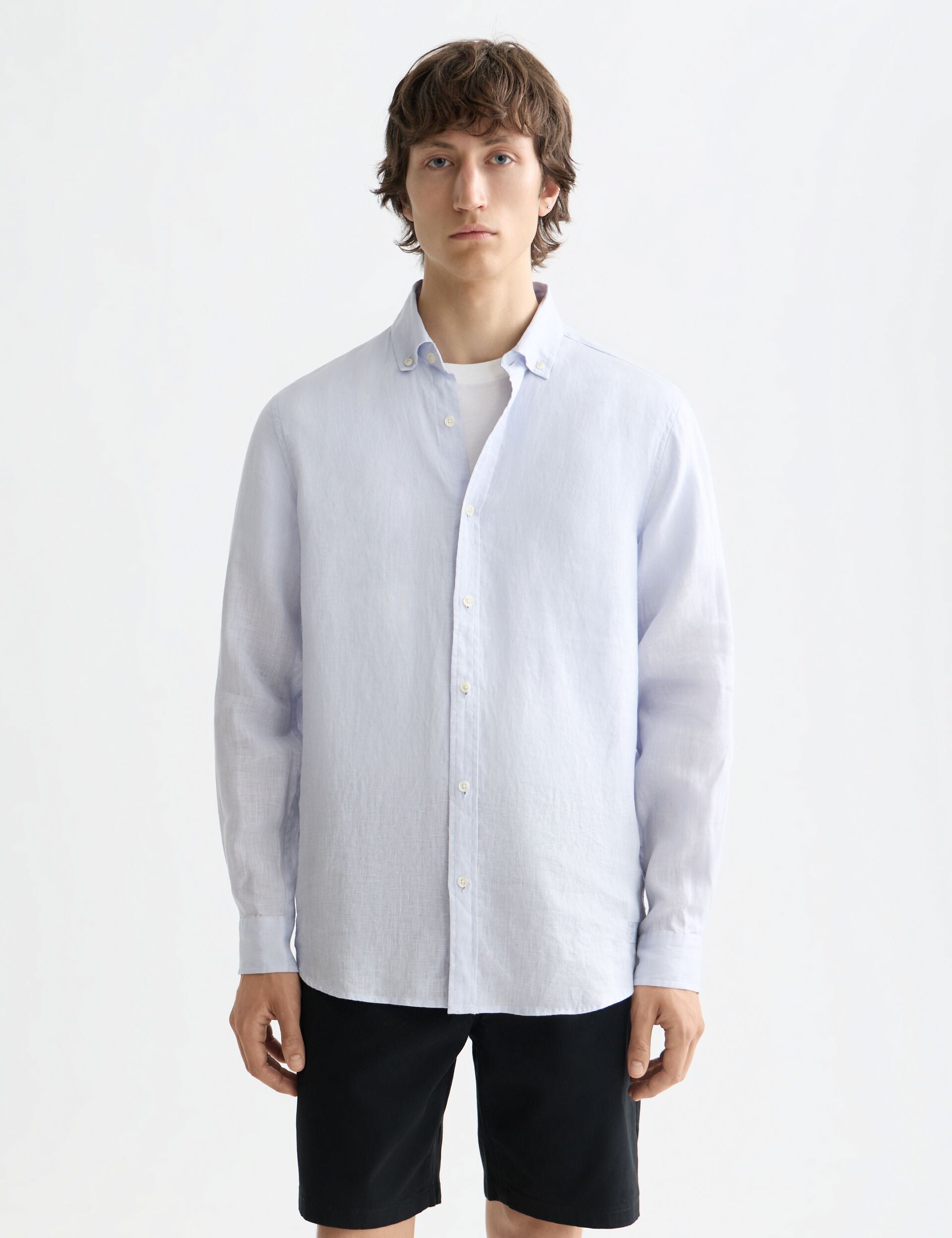 Long-sleeve linen shirt by Scotch & Soda, shown in a relaxed fit with natural fabric texture and button-down front.