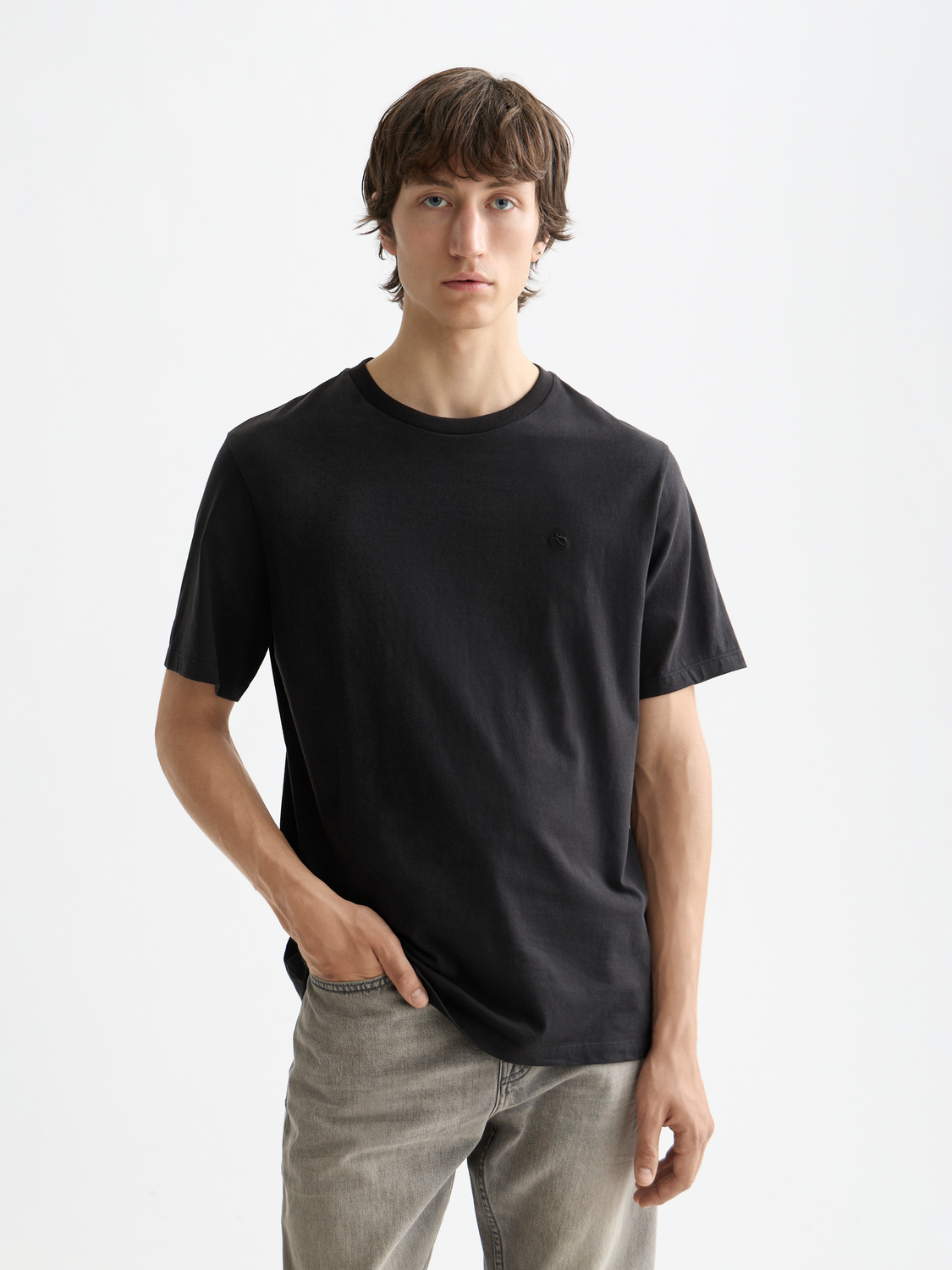 Short sleeve logo t-shirt by Scotch & Soda featuring a stylish graphic design on the front.