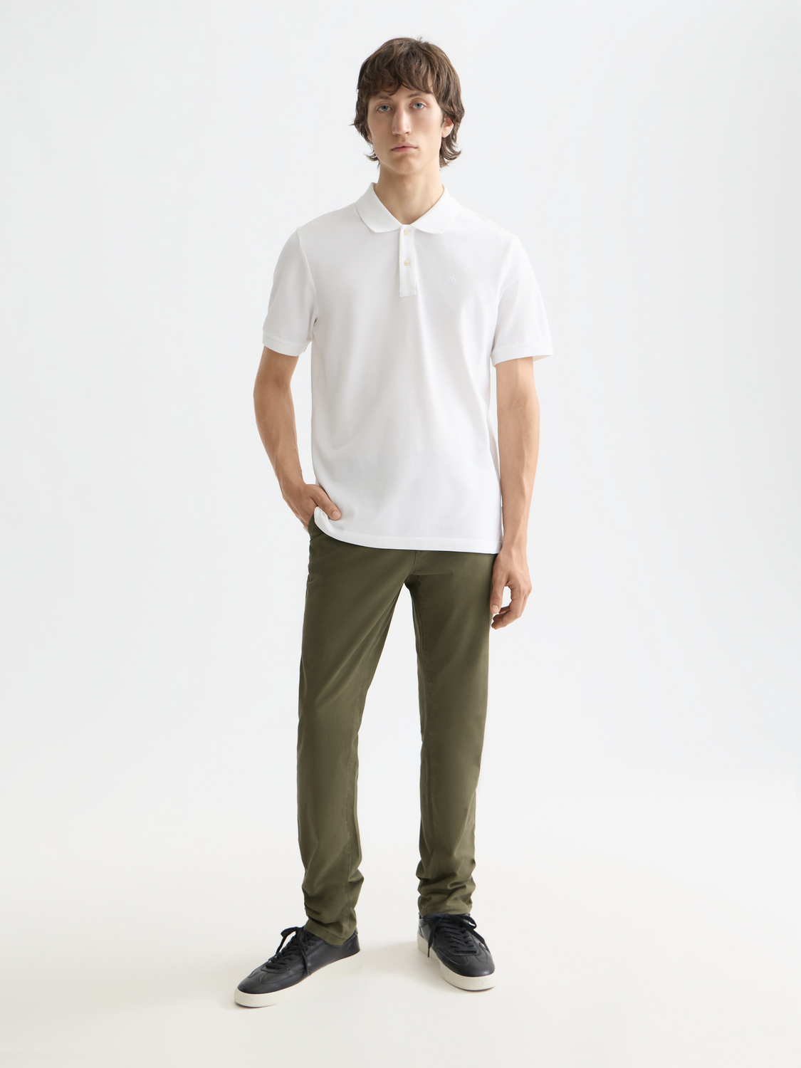 SCOTCH & SODA logo pique polo shirt in navy with short sleeves and classic collar, displayed on a plain background.