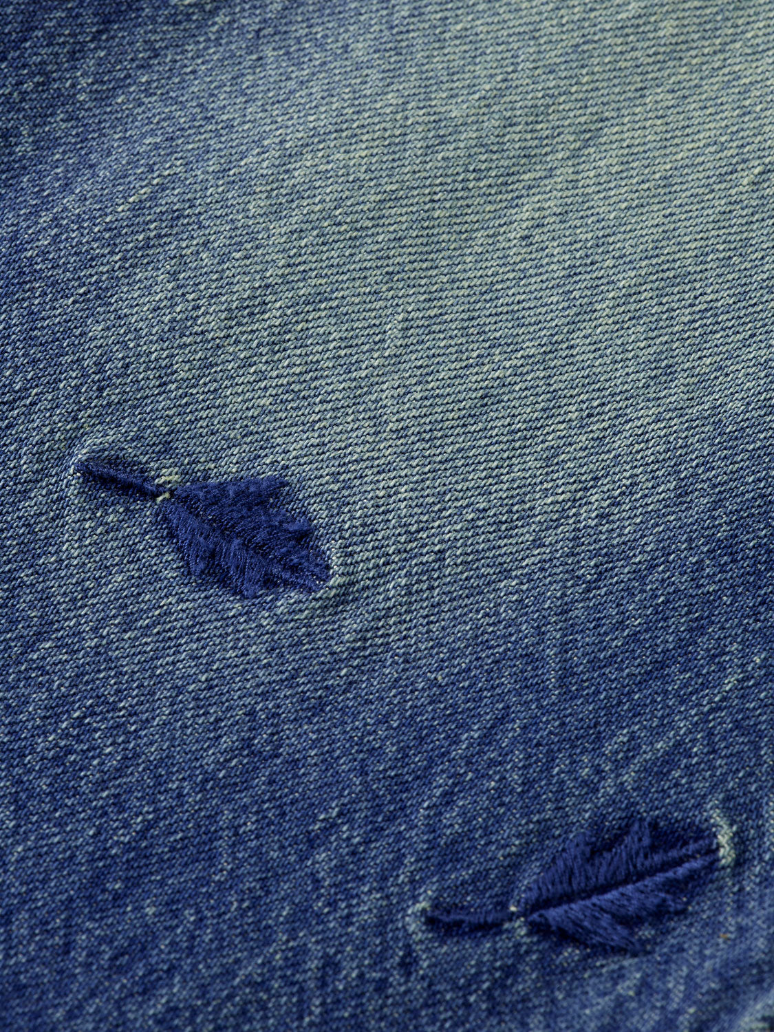 Kids' deep loose-fit denim jeans by Scotch & Soda, showing relaxed fit and classic blue denim fabric.