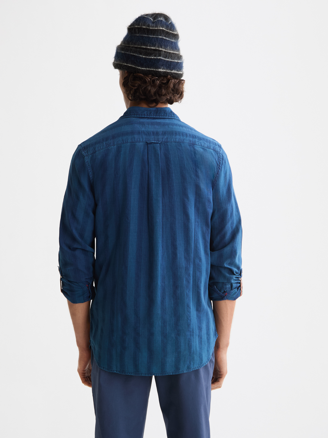 Textured indigo Scotch & Soda long-sleeve shirt with a back view, showcasing fabric details and stylish design.
