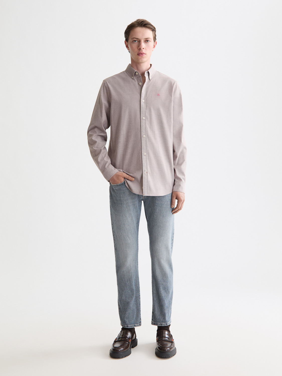 Scotch & Soda Zee straight-fit denim jeans showing classic blue denim fabric and front pockets.
