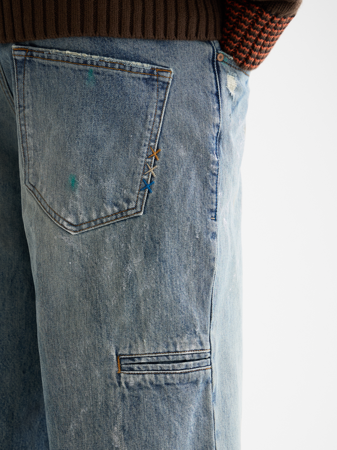Light blue Scotch & Soda Daze loose-fit denim jeans with classic five-pocket design and relaxed fit, shown on a model.