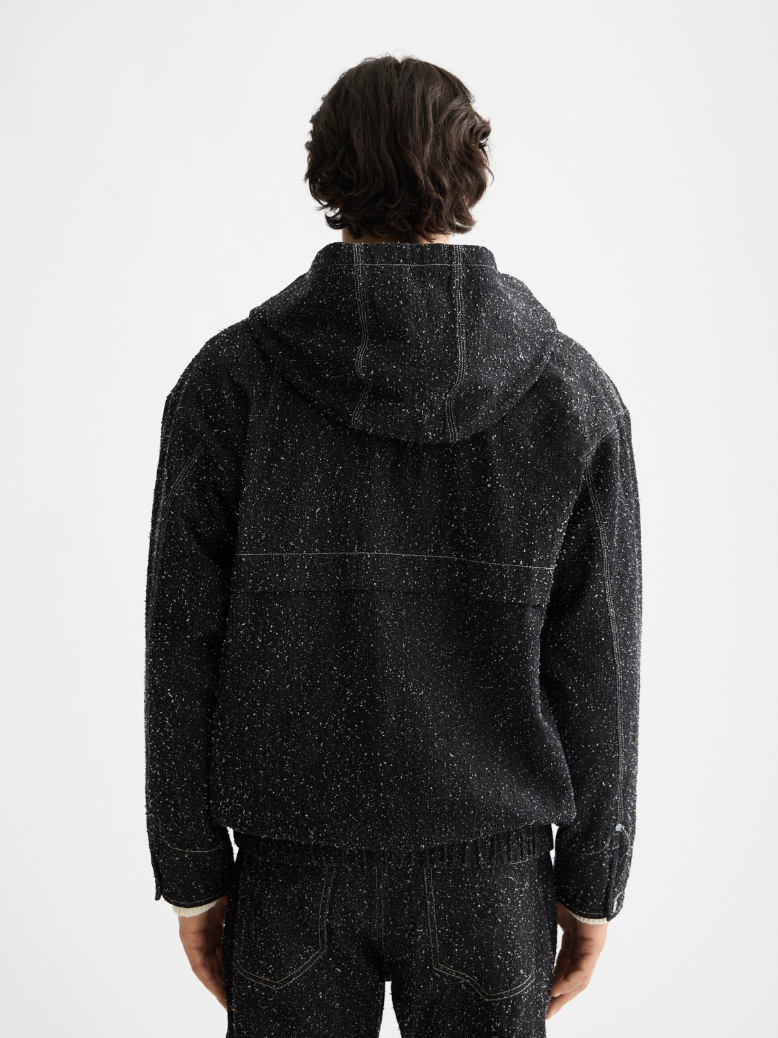 Light blue Scotch & Soda denim jacket with classic collar and button closure, shown from the back.