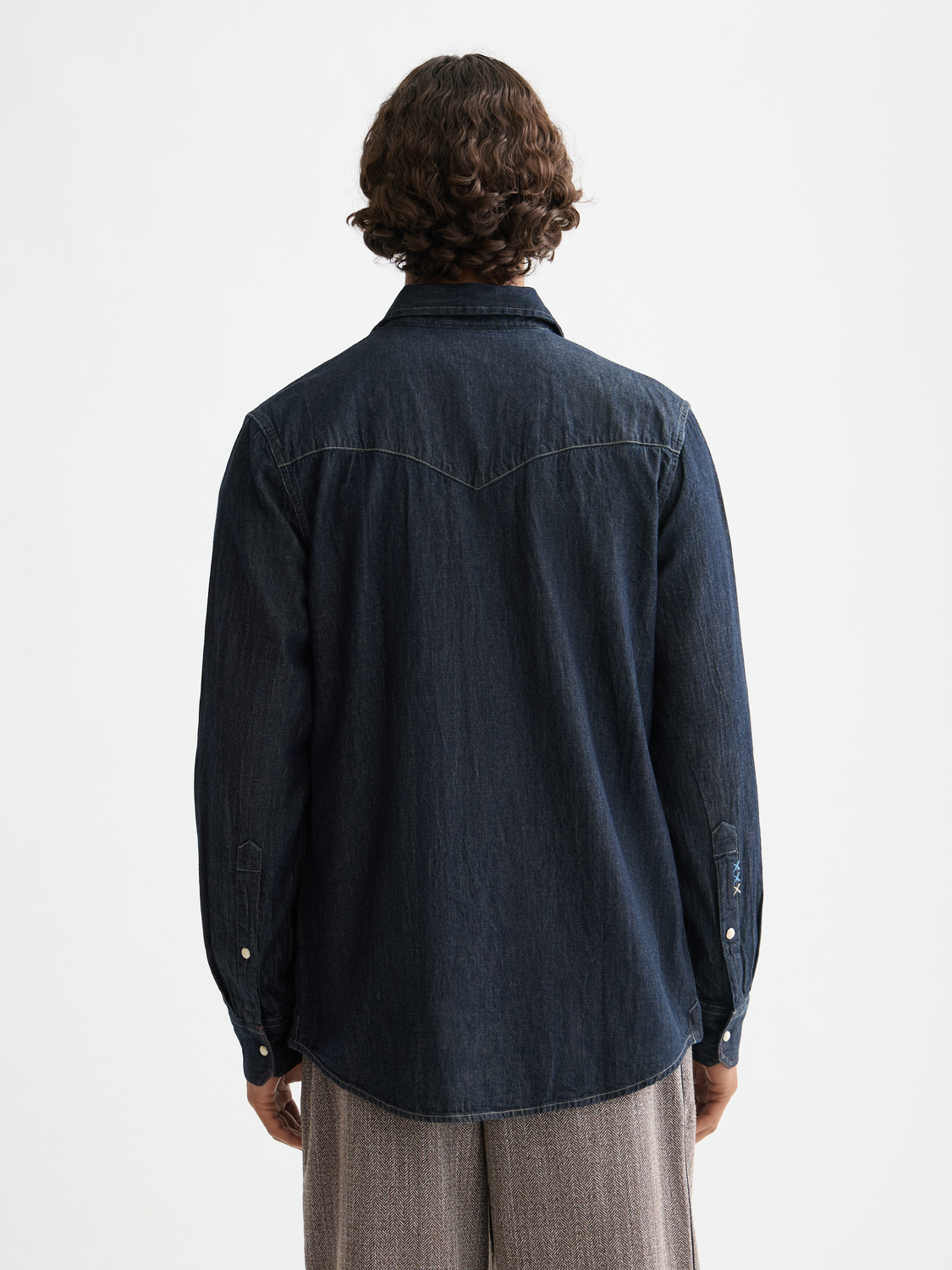 Long-sleeve Scotch & Soda Western shirt with classic plaid pattern and button-up front, shown from the back.
