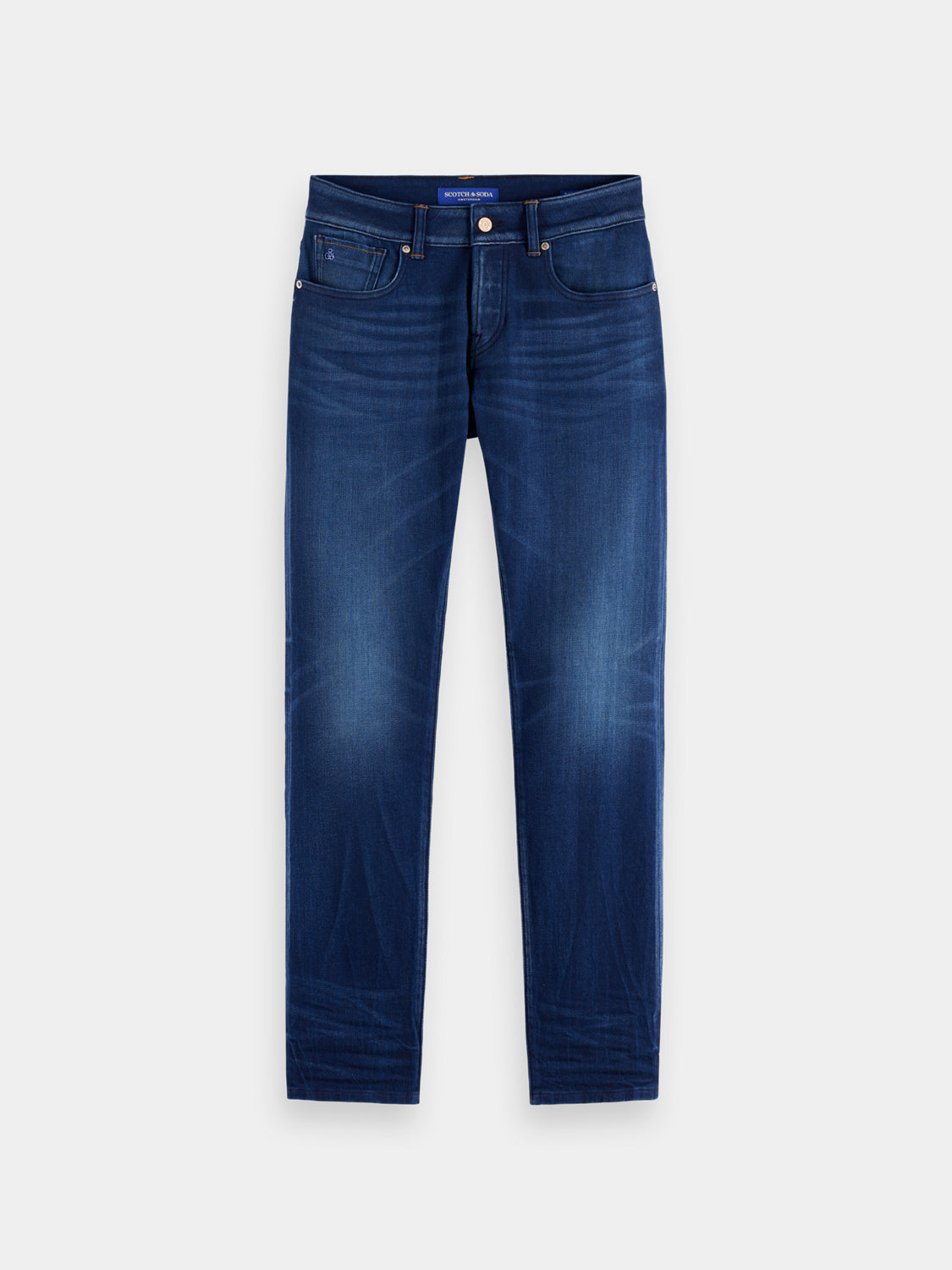 Slim-fit denim jeans by Scotch & Soda, showing classic five-pocket design and dark blue wash.