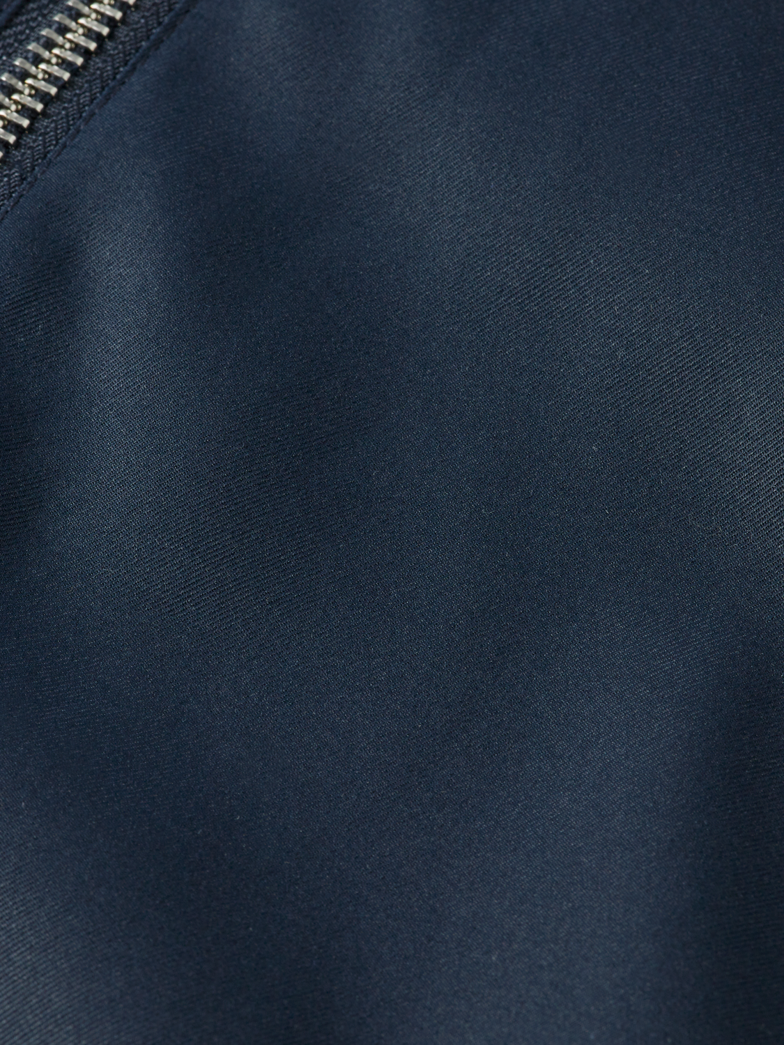Reversible Scotch & Soda bomber jacket with stylish design, shown with both outer and inner fabric patterns.