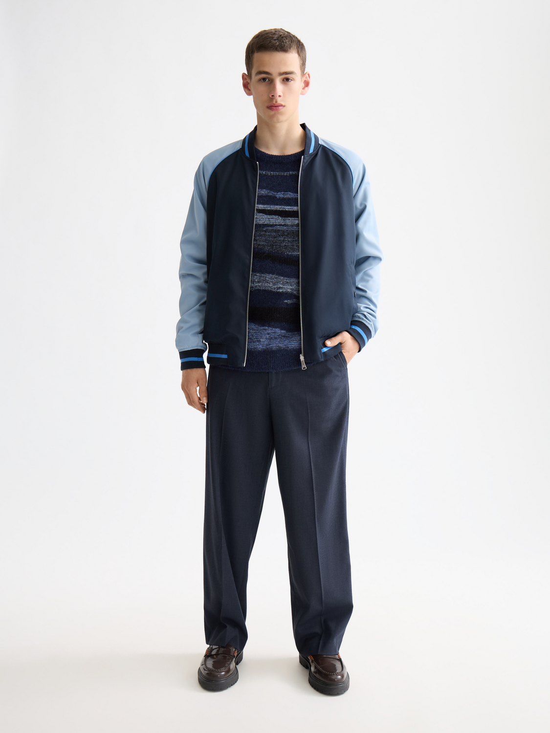 Reversible bomber jacket by Scotch & Soda with a stylish design, showing both outer and inner fabric textures.