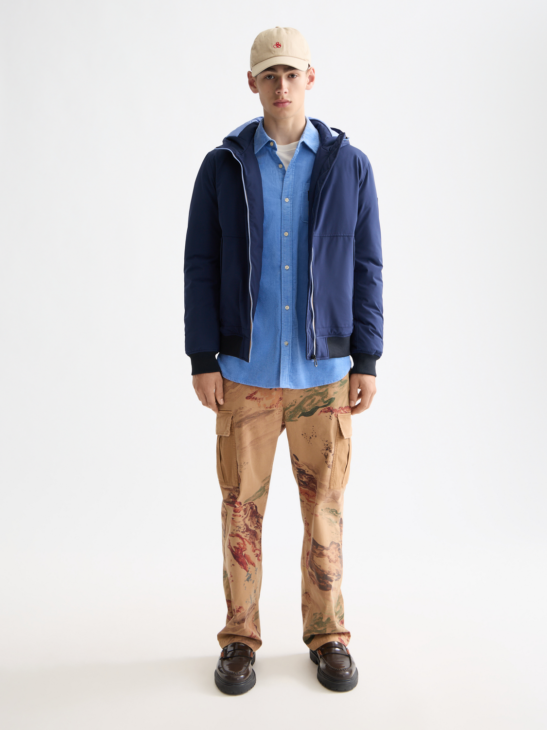 SCOTCH & SODA hooded softshell jacket with front zipper and adjustable hood, designed for outdoor wear and protection.