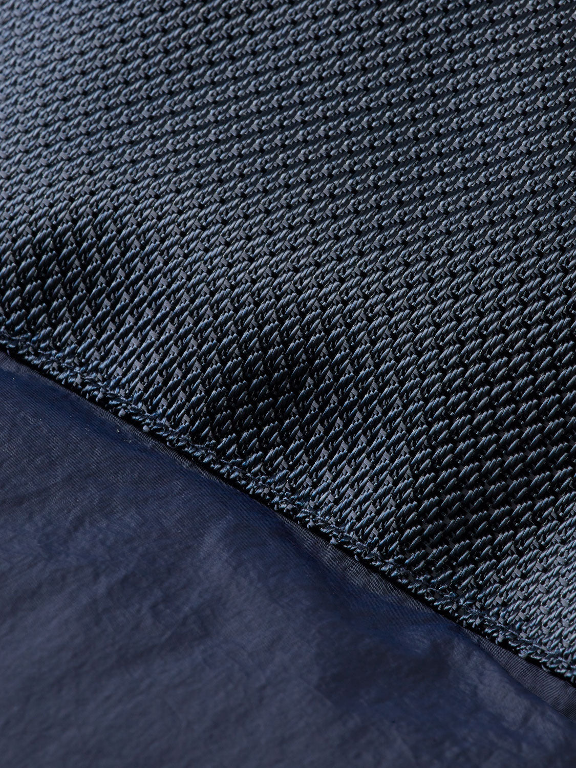 Black hooded puffer jacket by SCOTCH & SODA, featuring quilted design and front zipper, displayed on a hanger.