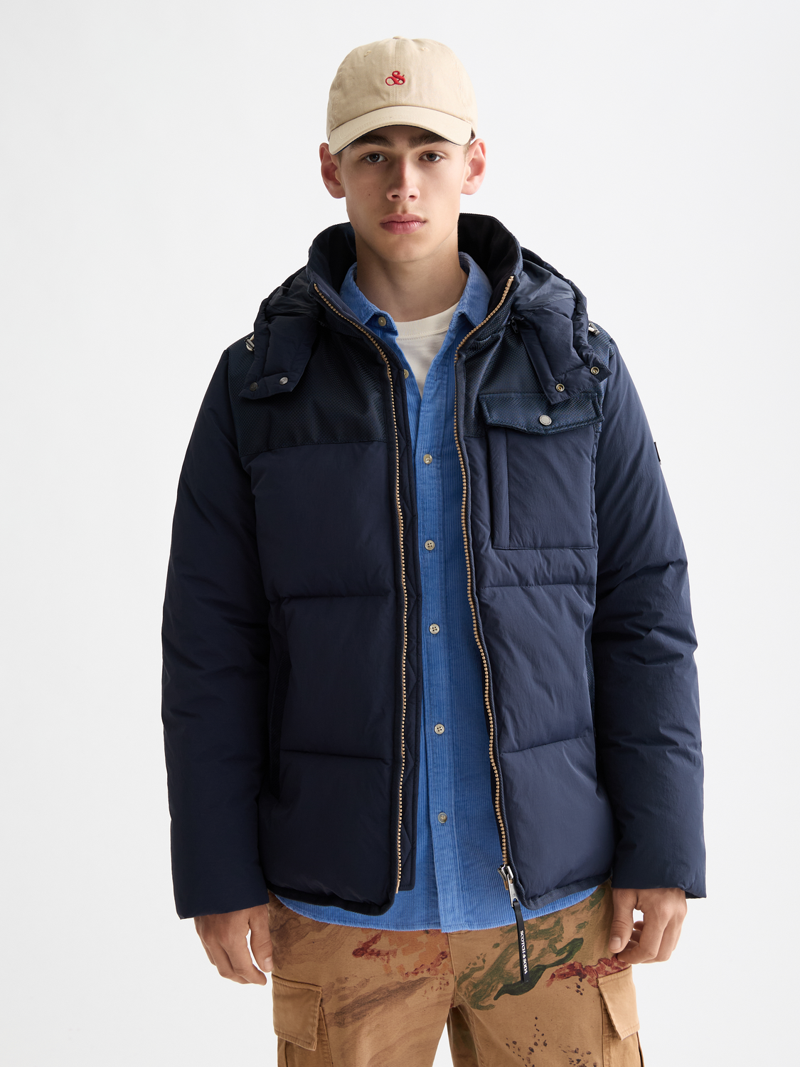 SCOTCH & SODA hooded puffer jacket with quilted design, front zipper, and adjustable hood, suitable for cold weather.