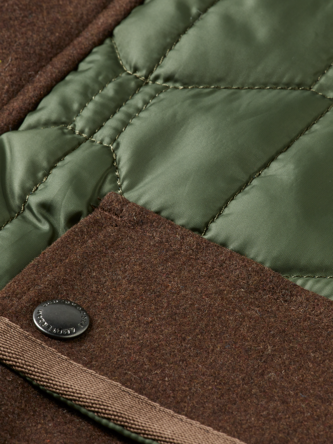 Quilted military jacket by Scotch & Soda featuring a padded design, front pockets, and a structured collar.