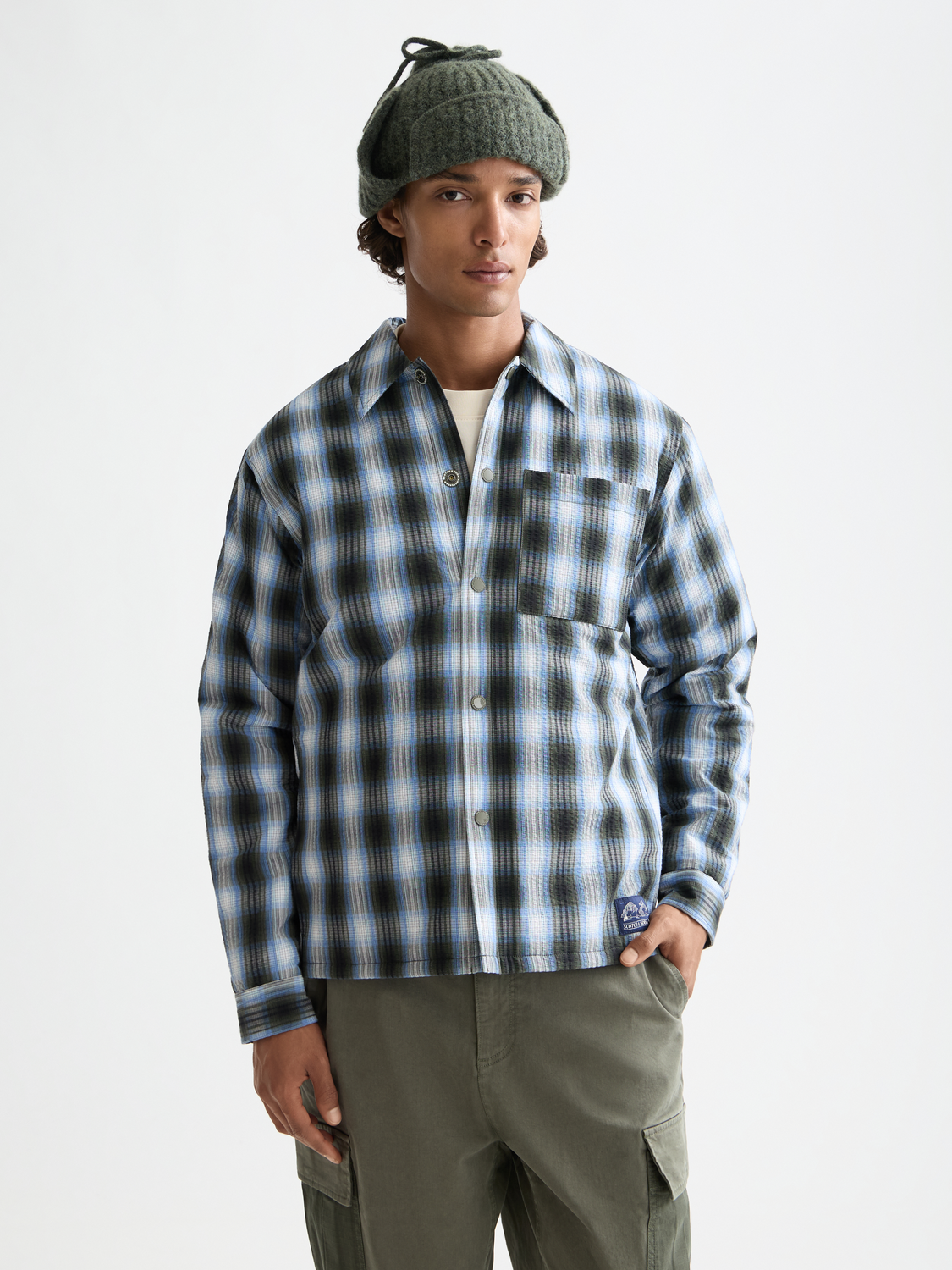 Seersucker padded overshirt jacket by Scotch & Soda with a lightweight, textured fabric and front button closure.