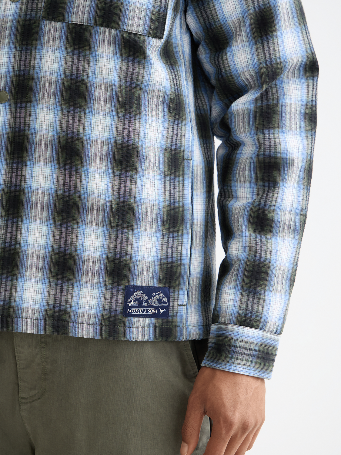 Scotch & Soda seersucker padded overshirt jacket in light blue with a textured seersucker fabric and padded design.
