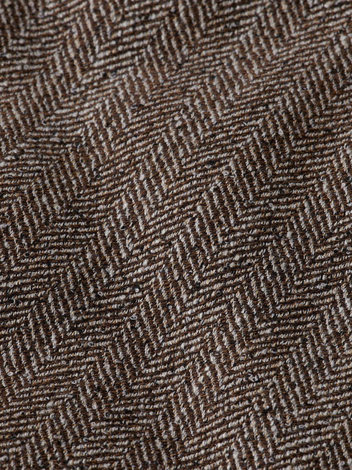 Reversible bomber jacket by Scotch & Soda featuring a stylish design, shown in a close-up view of the jacket's fabric and details.