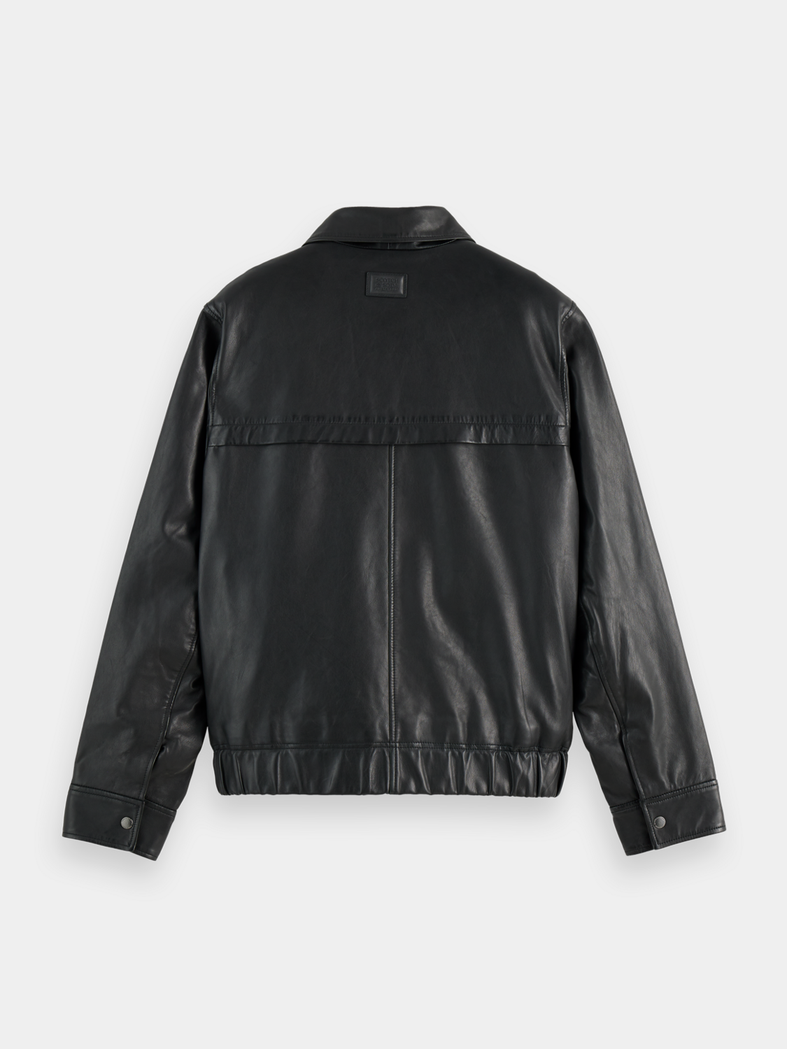 Black leather blouson jacket by Scotch & Soda, featuring a sleek design and classic collar, shown on a model.