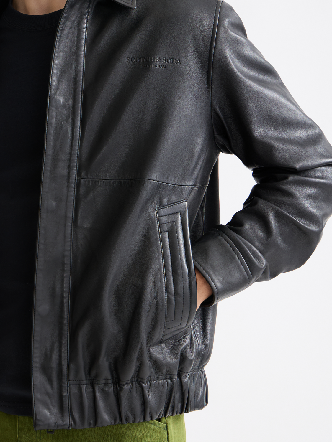Leather Scotch & SODA blouson jacket with a sleek fit, featuring detailed stitching and a classic collar.
