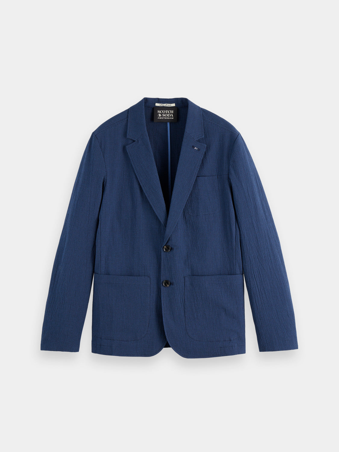 Seersucker blazer by Scotch & Soda, featuring a classic striped pattern, tailored fit, and lightweight fabric for stylish comfort.