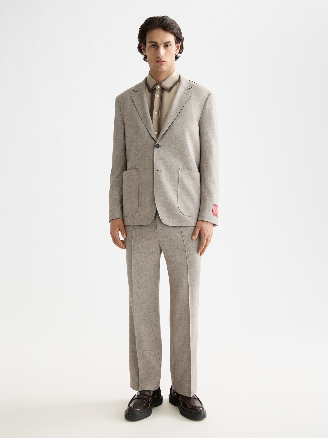 Unconstructed Scotch & Soda blazer in navy fabric, featuring a tailored fit and classic lapel design.