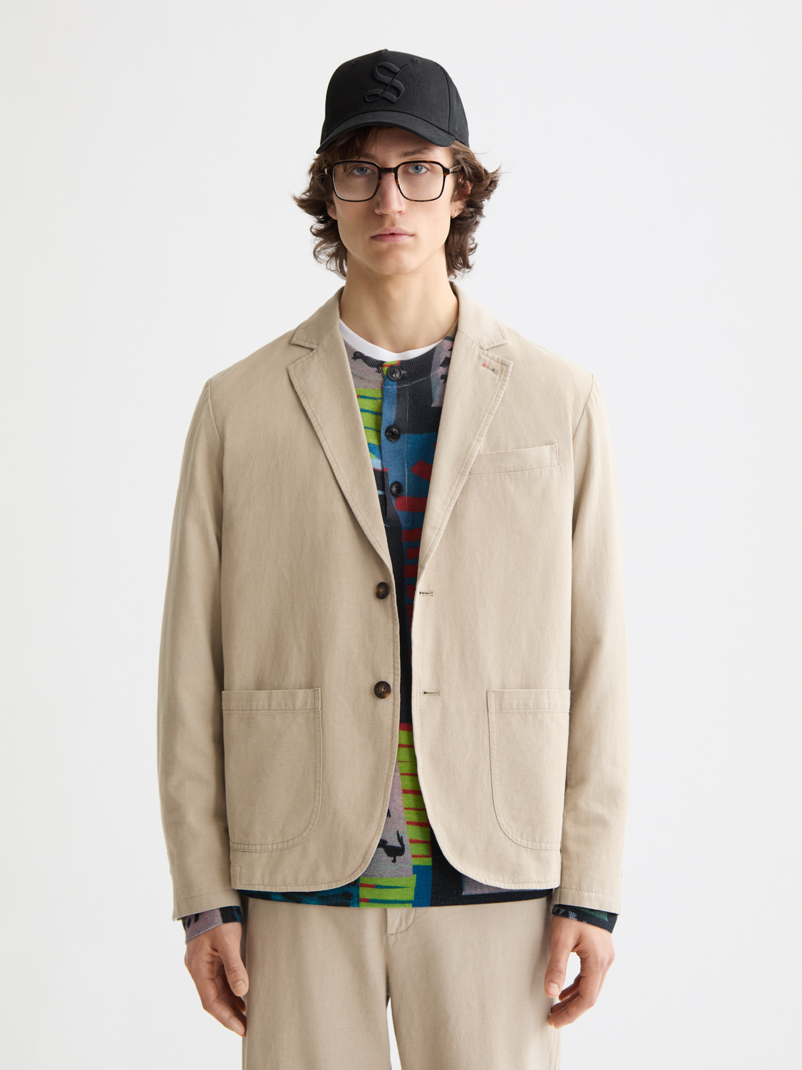 Relaxed-fit Scotch & Soda blazer with a tailored collar, front buttons, and classic design, shown in a neutral fabric.