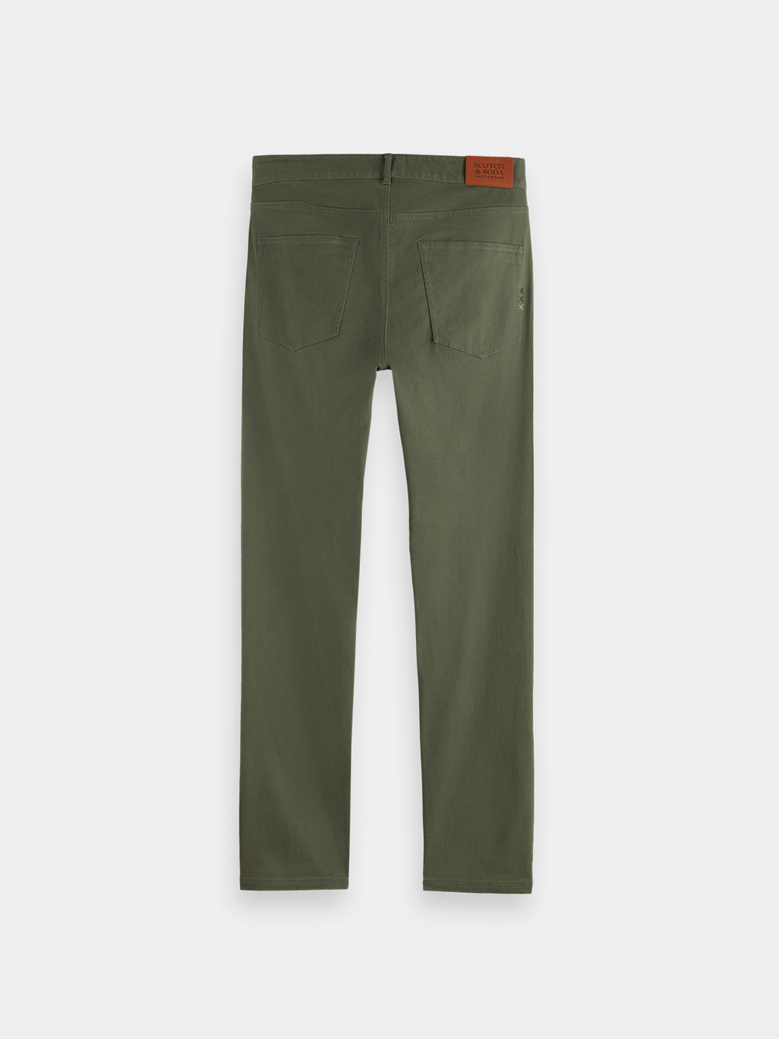 Black Ralston slim-fit 5-pocket pants by Scotch & Soda displayed on a hanger.