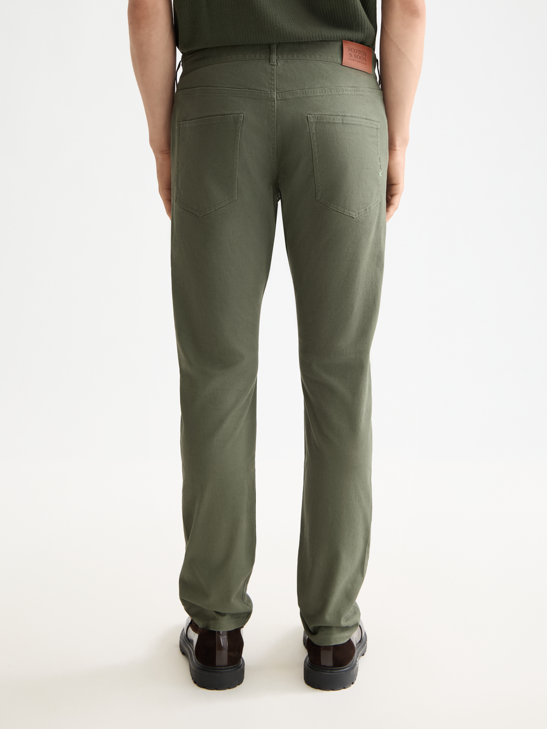 SCOTCH & SODA Ralston slim-fit 5-pocket pants in dark denim, shown from the back with a tailored fit and classic style.