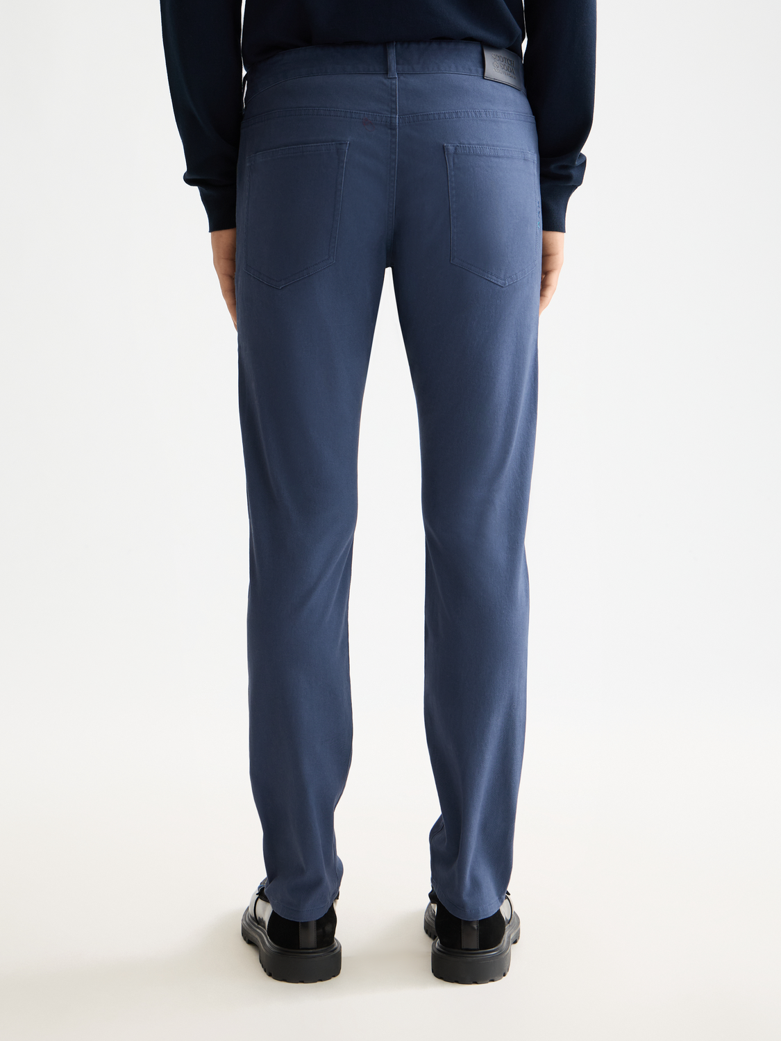 Scotch & Soda Ralston slim-fit 5-pocket pants in dark denim, back view showing tailored fit and classic pocket design.