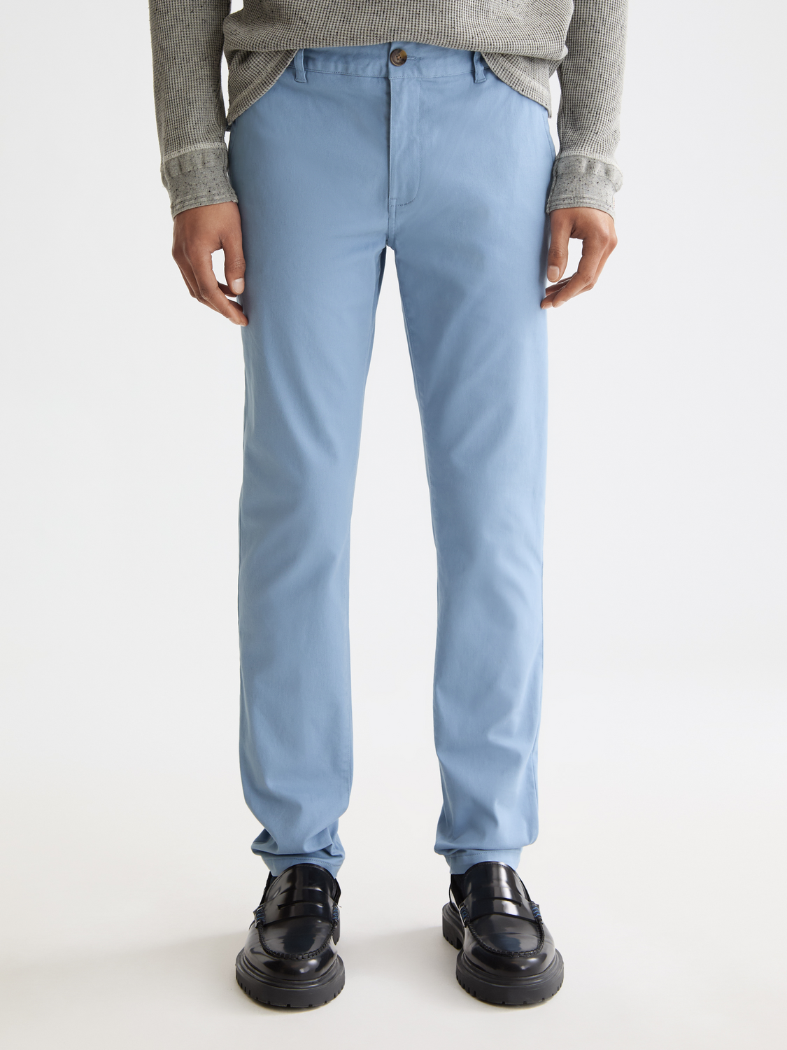 Slim-fit Mott chinos pants by Scotch & Soda in khaki with front view and classic design.