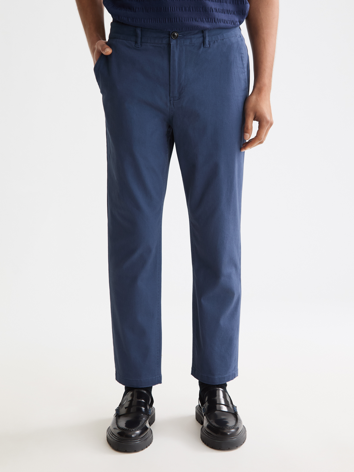 Drift tapered chinos pants by Scotch & Soda in a crpe fabric, shown in a front view with a slim fit and tapered design.