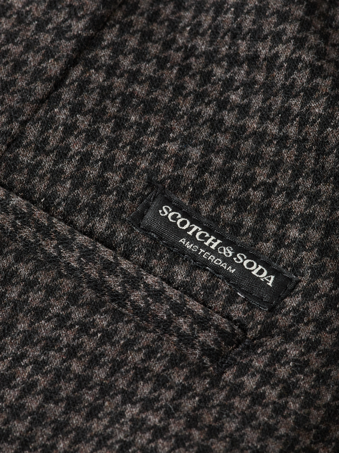 SCOTCH & SODA Mott super slim-fit chino pants in a sleek, tailored design, shown in a neutral color.
