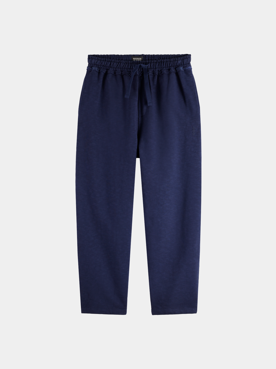 Garment-dyed sweatpants by Scotch & Soda, soft cotton fabric, relaxed fit, with elastic waistband and cuffs, in a muted color.