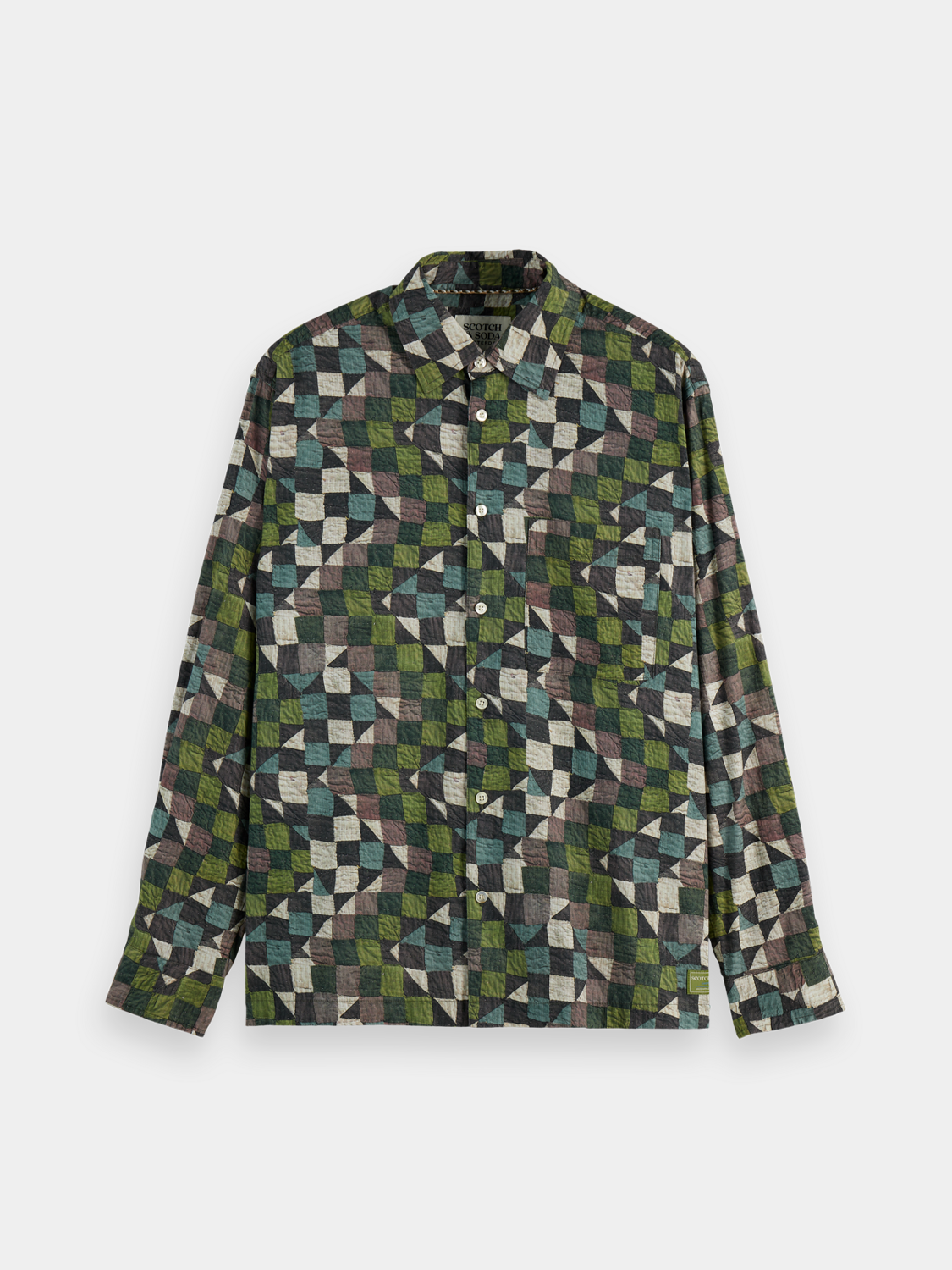 Long sleeve printed shirt by Scotch & Soda featuring vibrant patterns and casual fit, shown on a model.