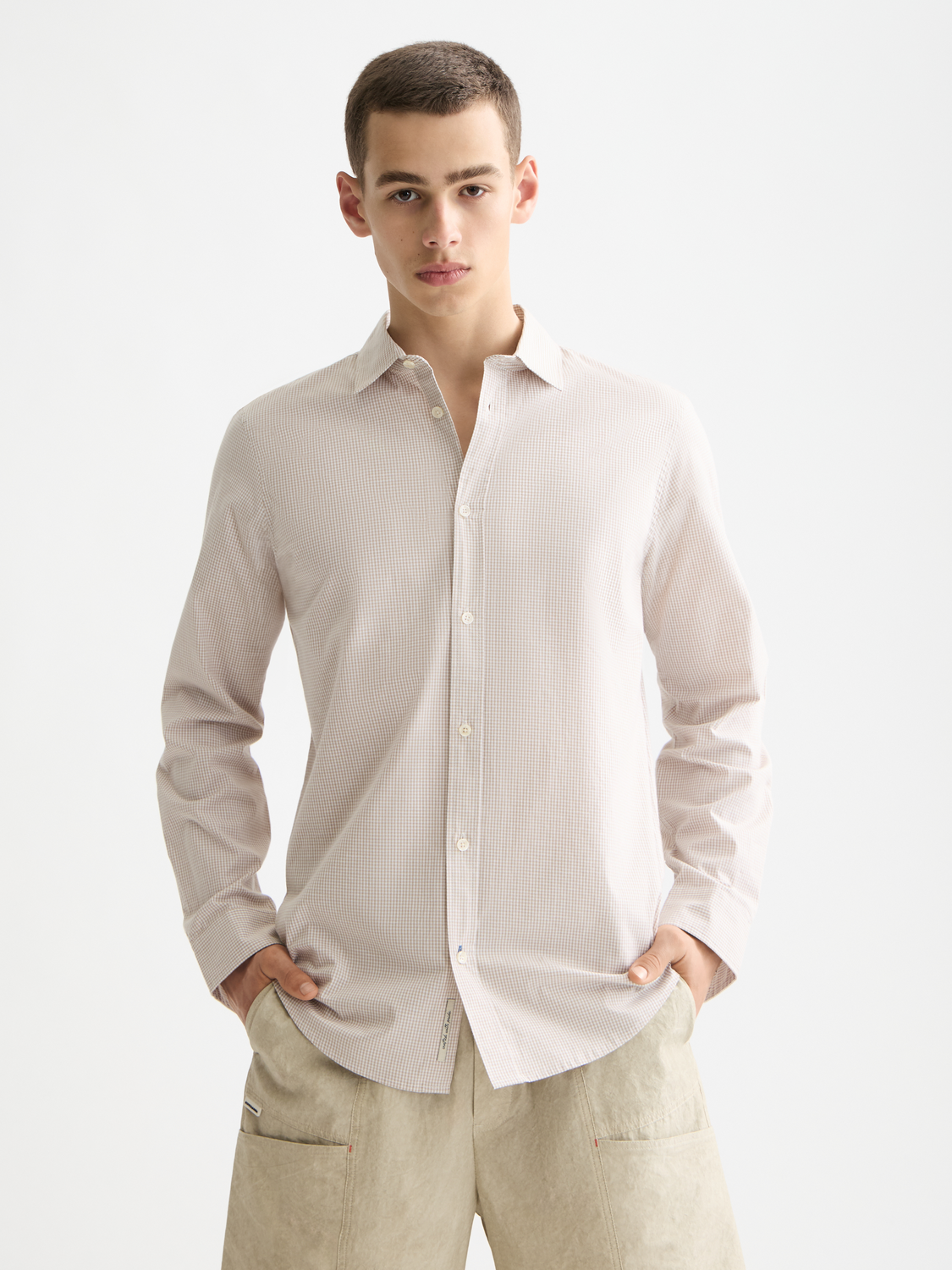 Long sleeve Scotch & Soda check poplin shirt with a classic pattern and button-down collar, shown in a front view.