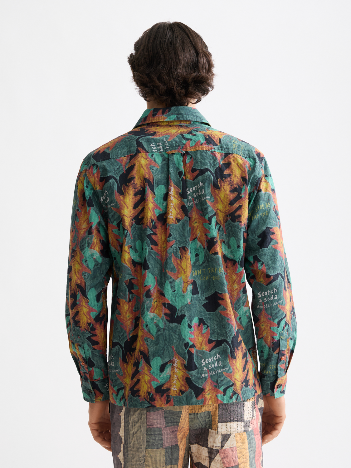 Long sleeve printed shirt by Scotch & Soda, showing a detailed floral pattern on the back.