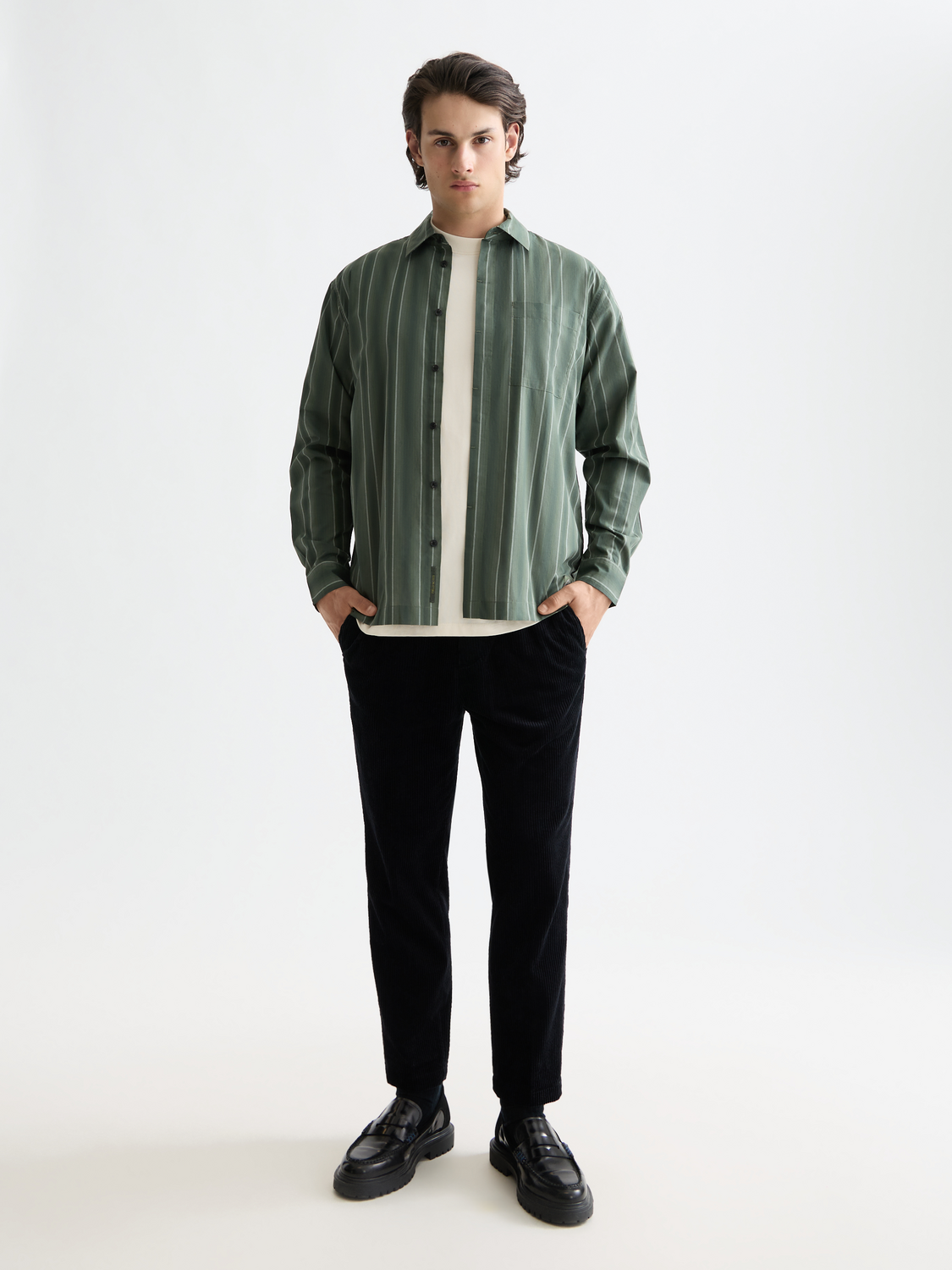 Long-sleeve striped shirt by Scotch & Soda, featuring a stylish pattern and classic fit, displayed on a neutral background.