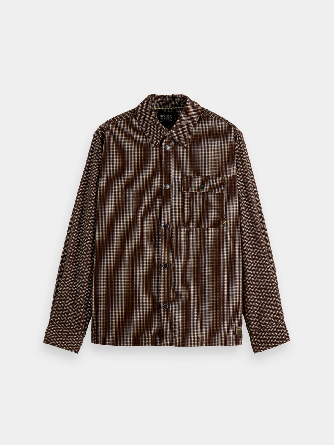 Long sleeve structured shirt by Scotch & Soda, featuring a tailored fit and classic design in neutral fabric.