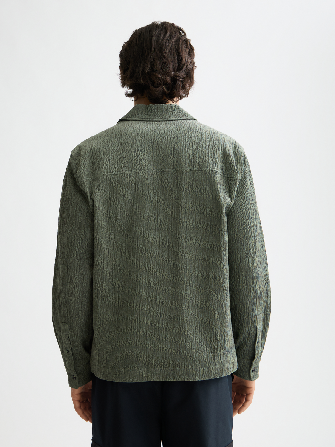 Long sleeve Scotch & Soda quarter zip corduroy shirt in a rich color, shown from the back.