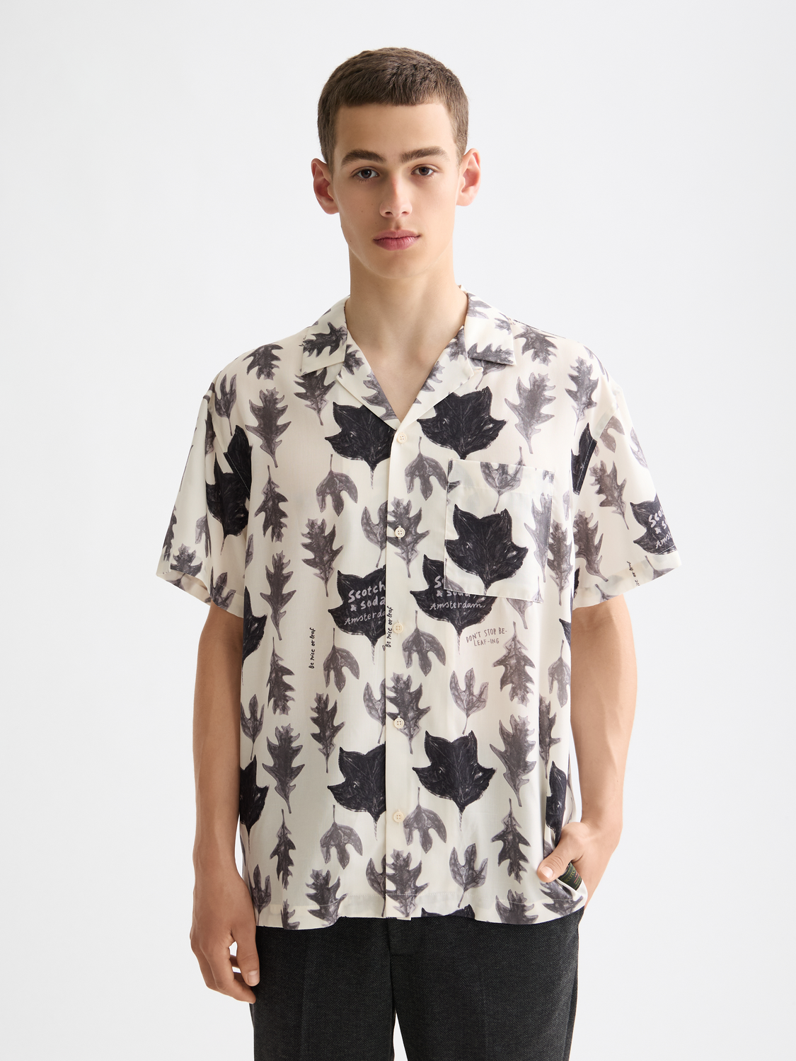 Printed short-sleeved shirt from Scotch & Soda featuring vibrant floral patterns and a casual fit.
