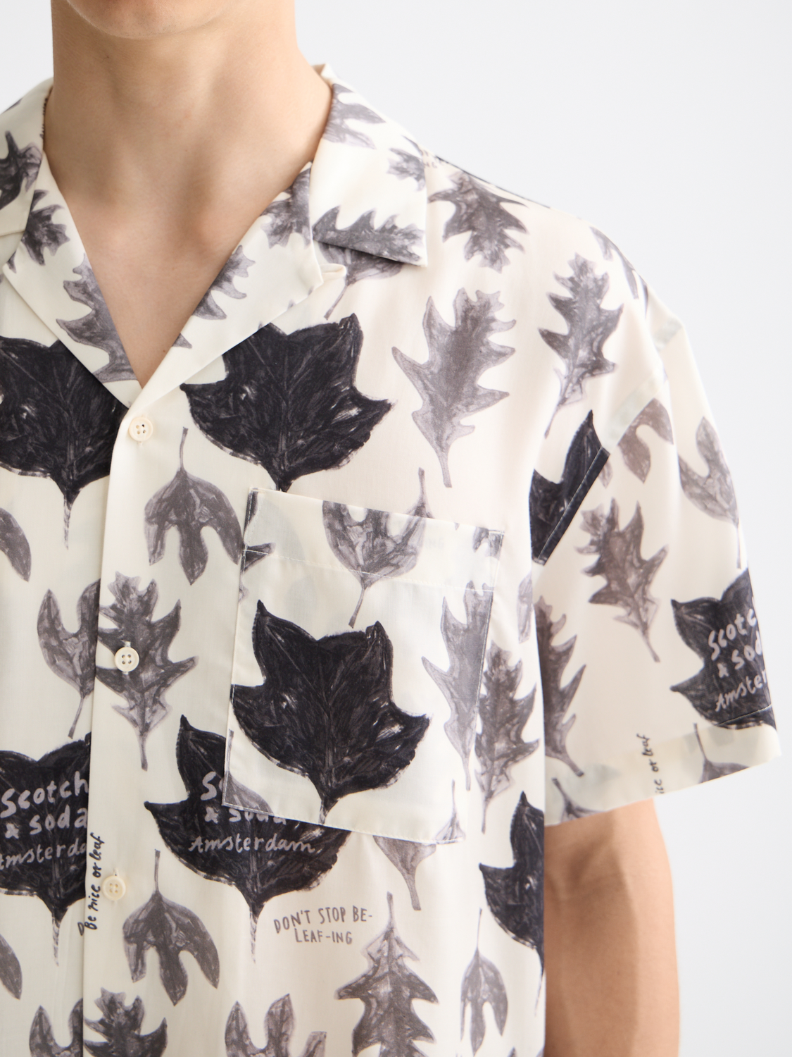 Printed short-sleeved shirt from Scotch & Soda featuring a stylish design, casual fit, and vibrant pattern.