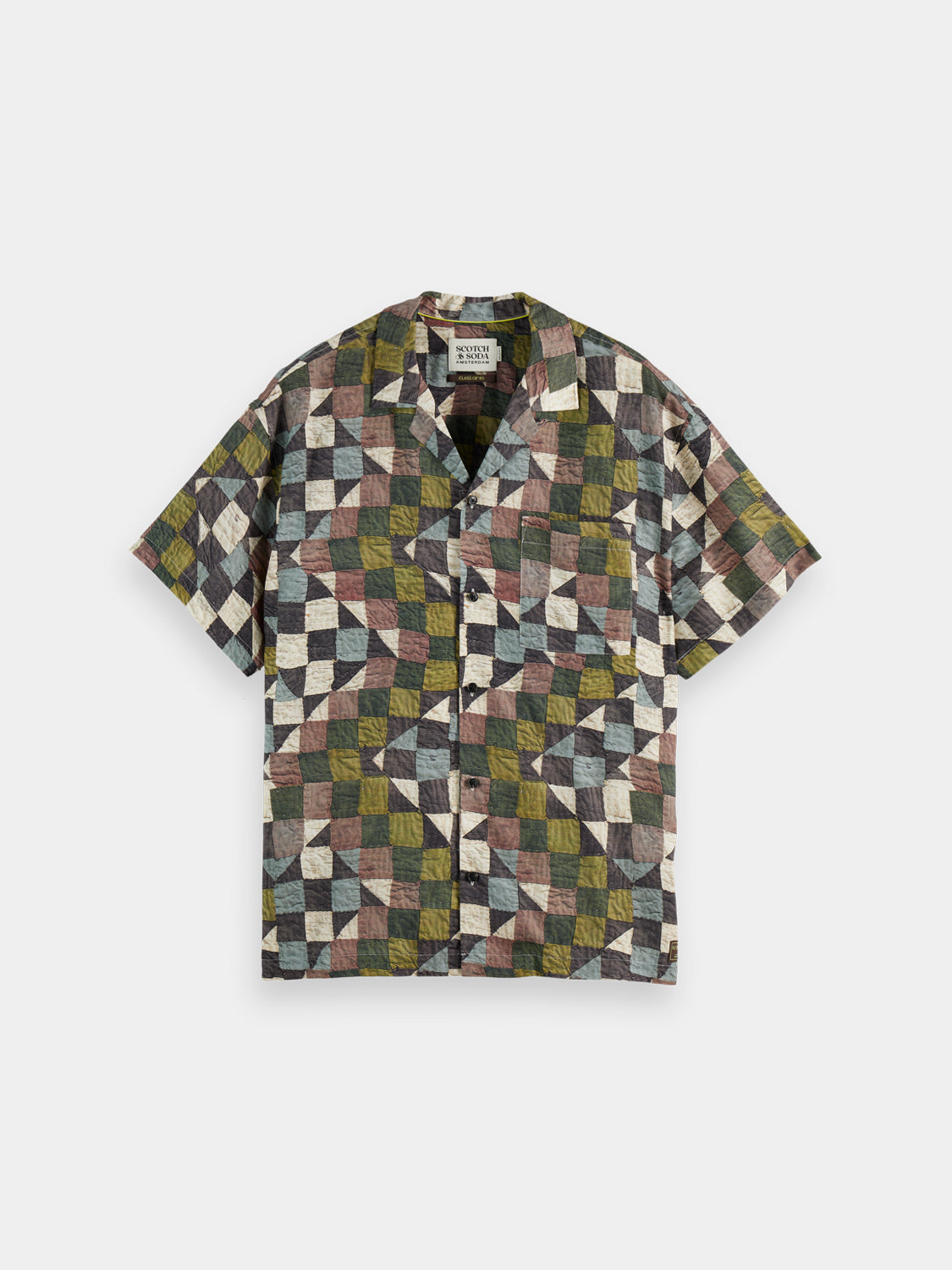 Printed short-sleeved shirt by Scotch & Soda featuring colorful floral pattern and classic fit, displayed on a hanger.