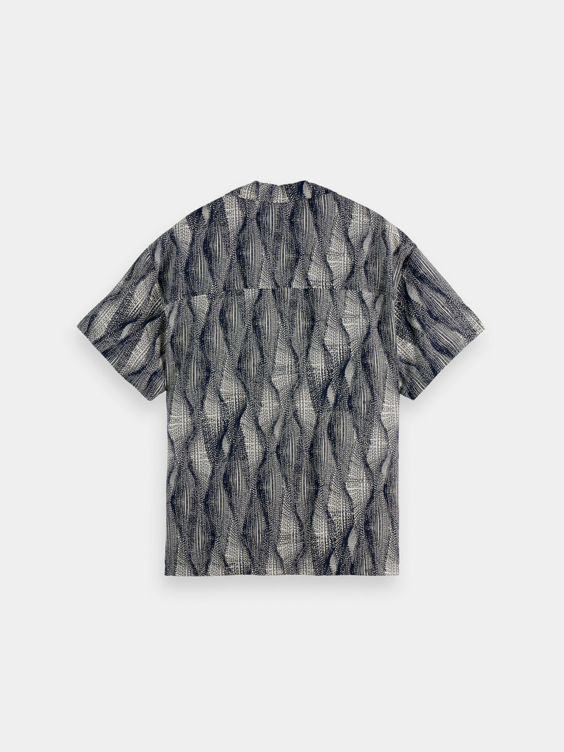 Printed short-sleeved shirt by Scotch & Soda featuring vibrant patterns, casual fit, and lightweight fabric for warm weather.