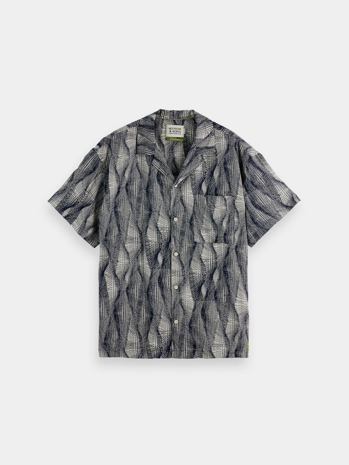 Printed short-sleeved shirt from Scotch & Soda with vibrant pattern and casual fit, displayed on a hanger.