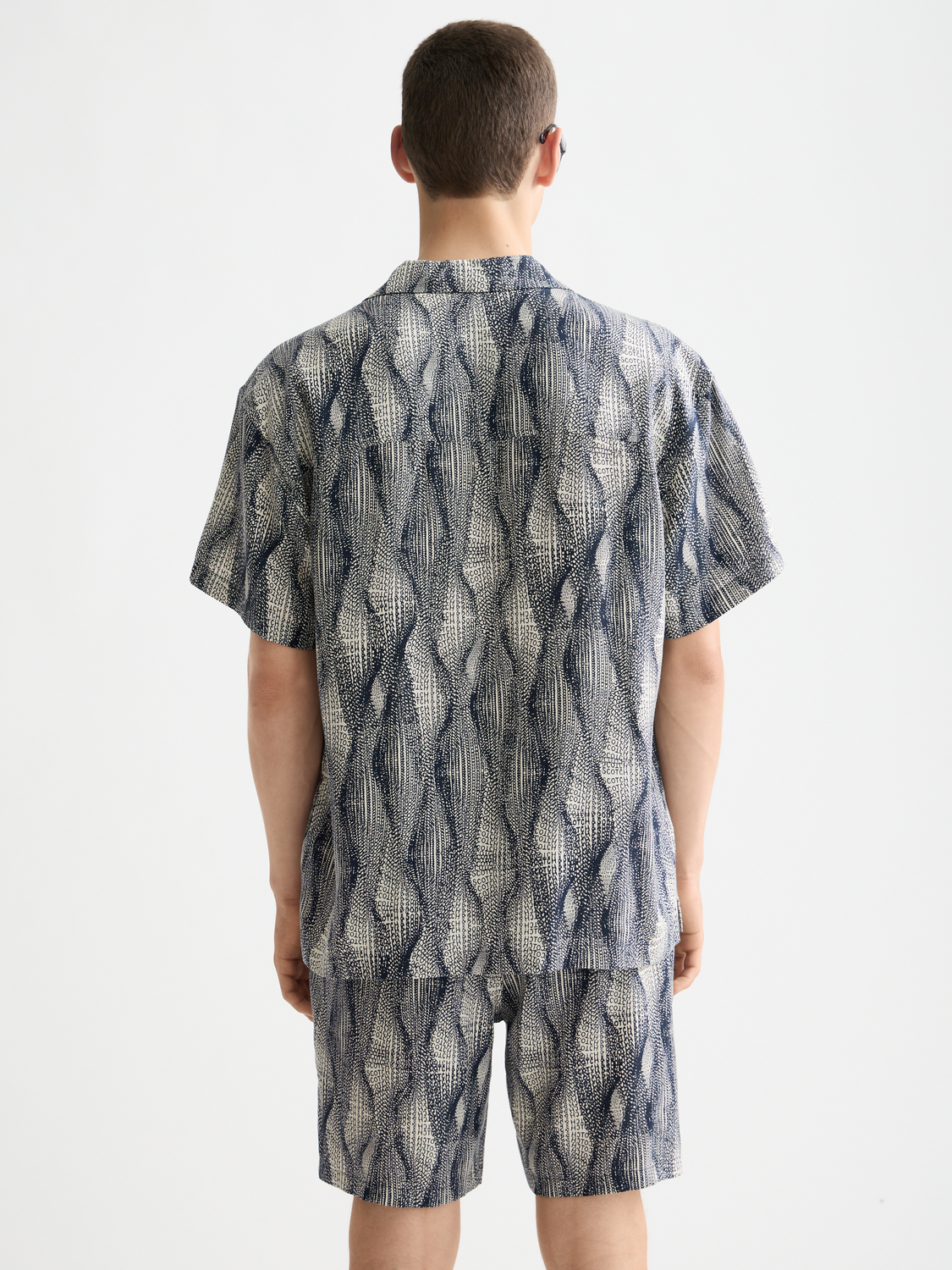 Printed short-sleeved shirt by Scotch & Soda featuring a vibrant, stylish design with a relaxed fit and button-front closure.