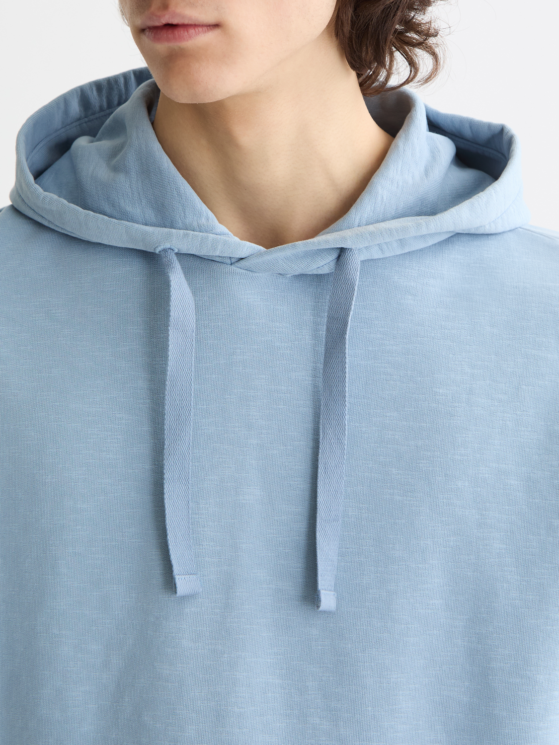 Garment-dyed hoodie from Scotch & Soda, casual sweats with a relaxed fit, shown in a soft, faded color.