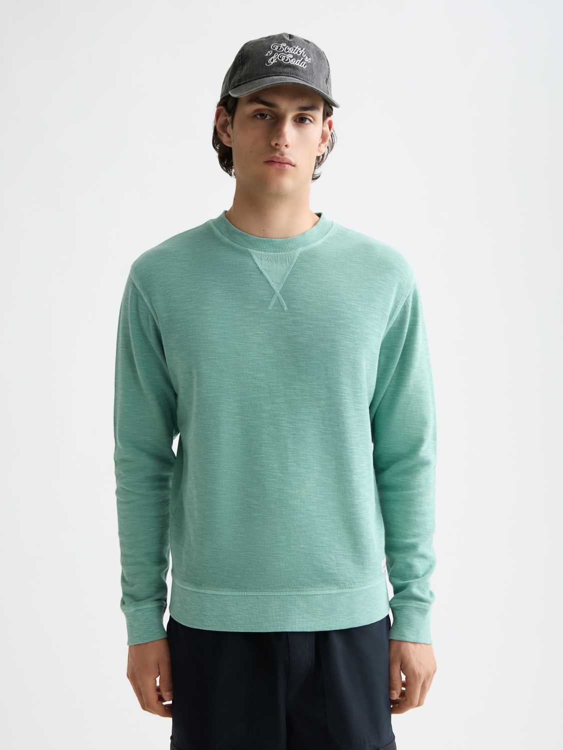 Scotch & Soda garment-dyed sweatshirt in soft cotton, featuring a relaxed fit, crew neckline, and casual style.