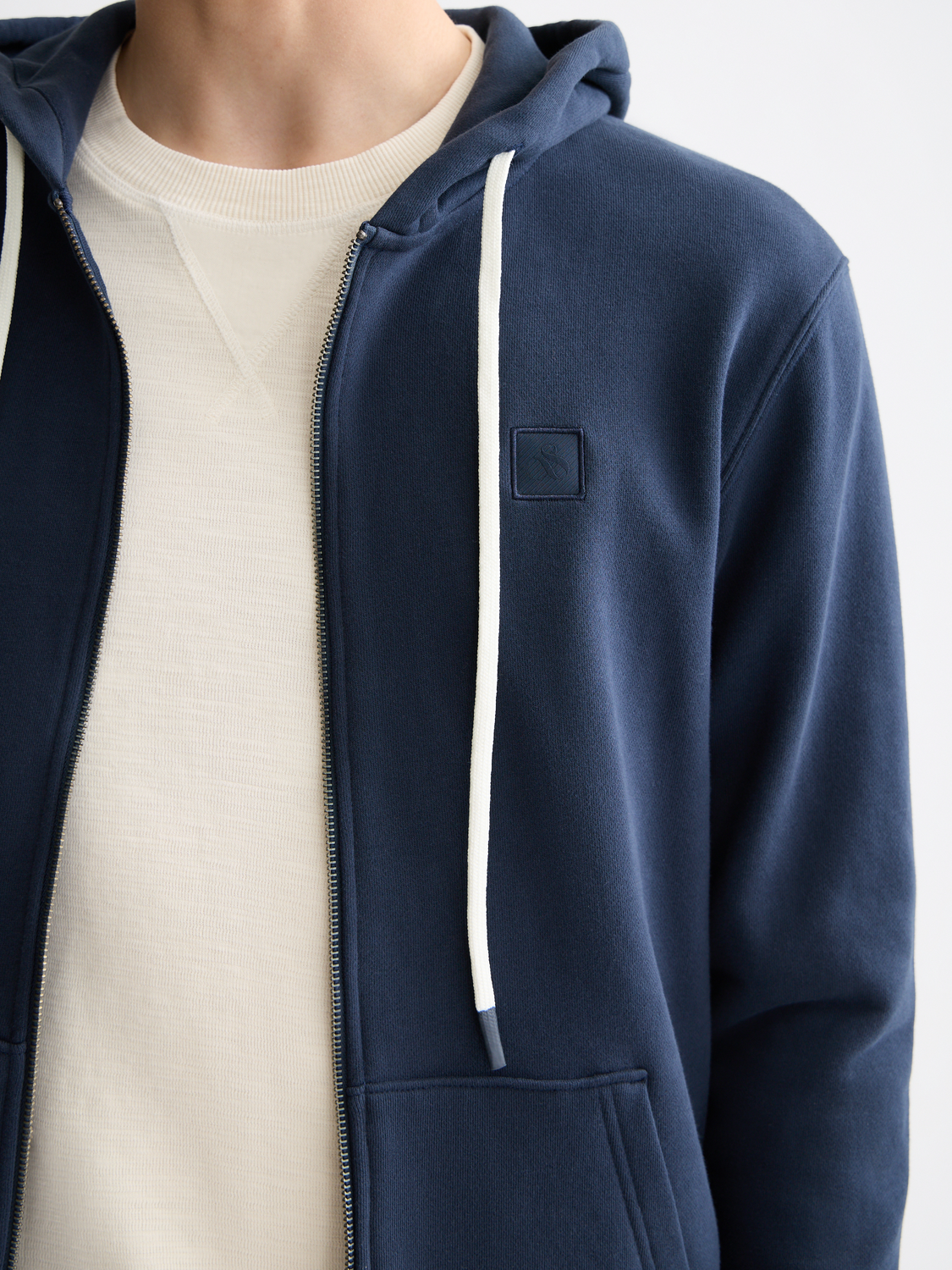 Scotch & Soda zip-through logo hoodie in gray, showing the front view with a hood and logo print on the chest.