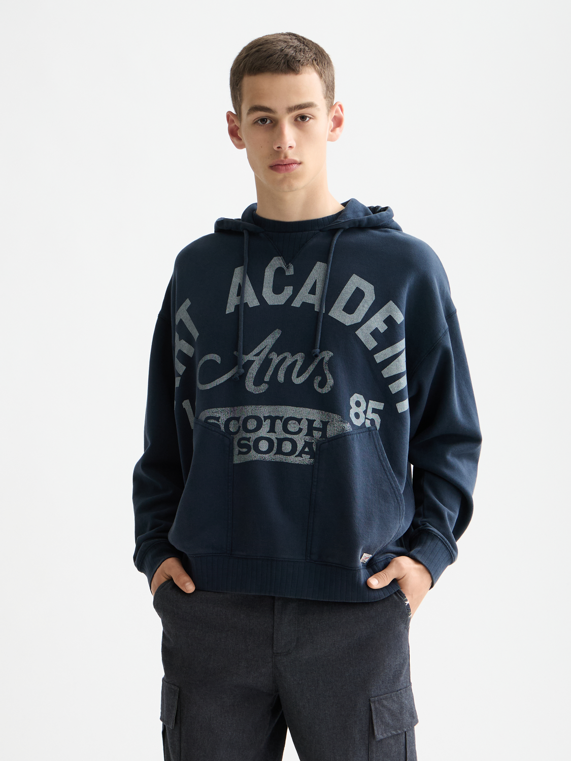SCOTCH & SODA artwork hoodie sweats with graphic print, soft fabric, and comfortable fit, displayed on a hanger.