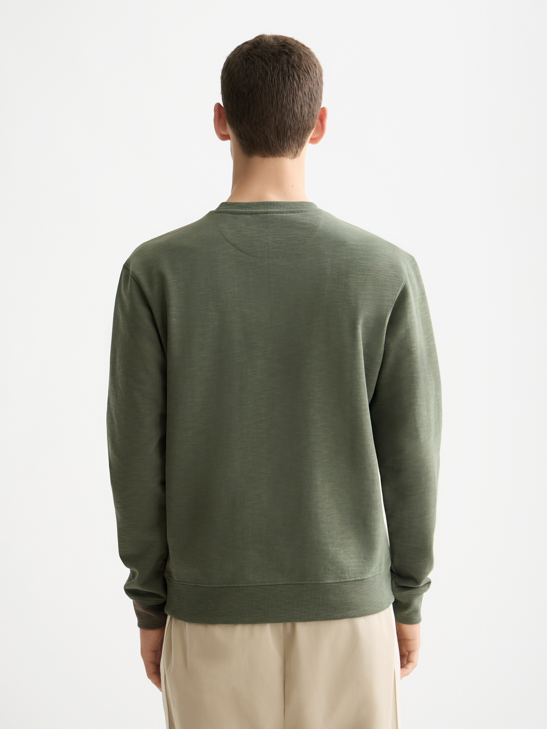 Black sweatshirt with chest logo from Scotch & Soda, featuring a casual fit and soft fabric, perfect for everyday wear.